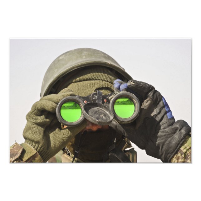 An Afghan soldier scans the horizon Photo Print (Front)