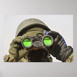 An Afghan soldier scans the horizon Poster