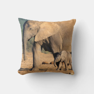 An African Elephant mother and calf on the move Cushion