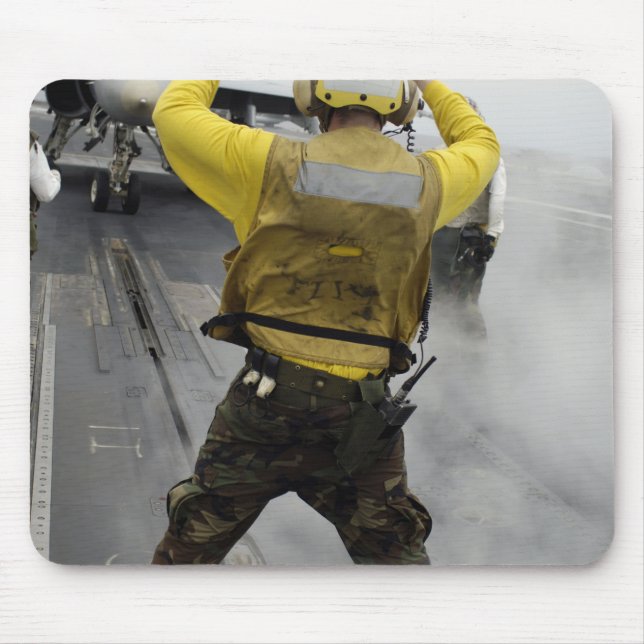 An aircraft director signals a F/A-18C Hornet Mouse Mat (Front)