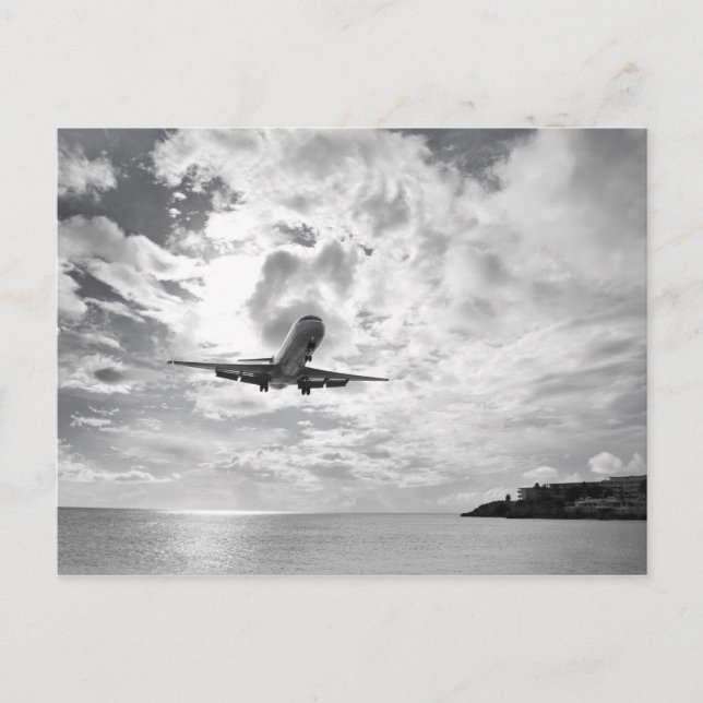 An airliner comes in for a landing at Princess Postcard (Front)