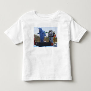An airman stands in a tub toddler T-Shirt