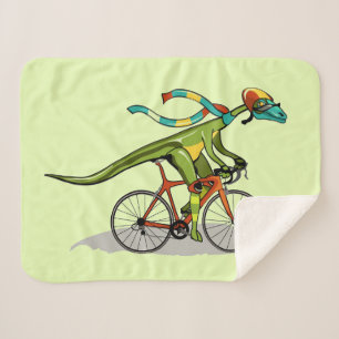 An Anabisetia Dinosaur Riding A Bicycle. Sherpa Blanket