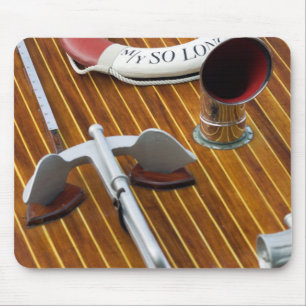 An Anchor And A Life-Buoy On A Wooden Boat Mouse Mat
