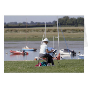 An artist at Bosham Harbour, West Sussex, England.