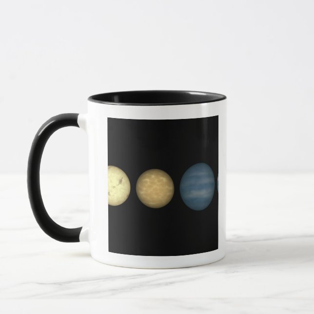 An artist's rendition comparing brown dwarfs 2 mug (Left)