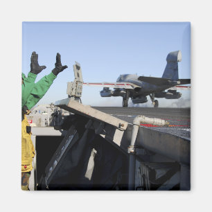 An EA-6B Prowler launches from the flight deck Magnet