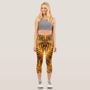 An elegant brown colour all over fabric pattern  capri leggings