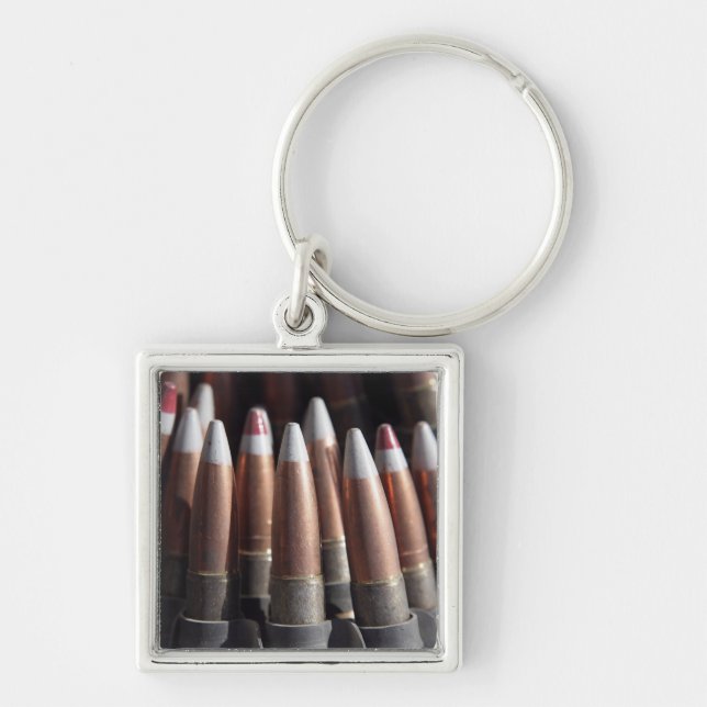 An even mix of four ball rounds to one tracer key ring (Front)