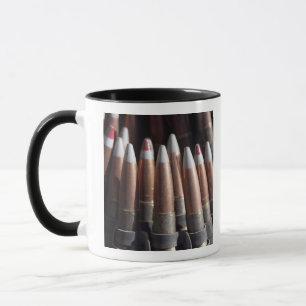 An even mix of four ball rounds to one tracer mug