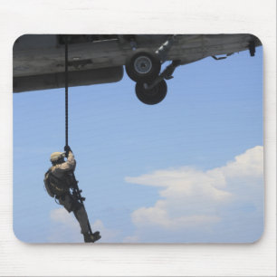 An explosive ordinance disposal technician mouse mat