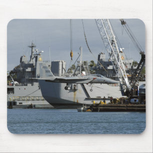 An F-15 Eagle gets a lift from a barge crane Mouse Mat