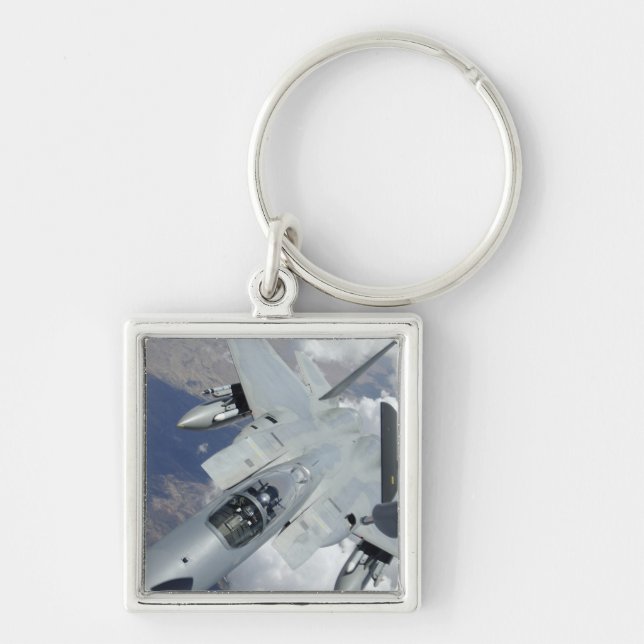 An F-15 Eagle pulls away from a KC-135 Key Ring (Front)