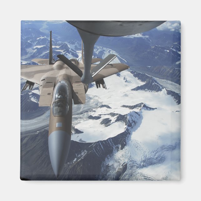 An F-15C Eagle aircraft sits behind a KC-135R Magnet (Front)