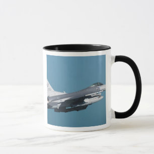 An F-16 Fighting Falcon in flight Mug