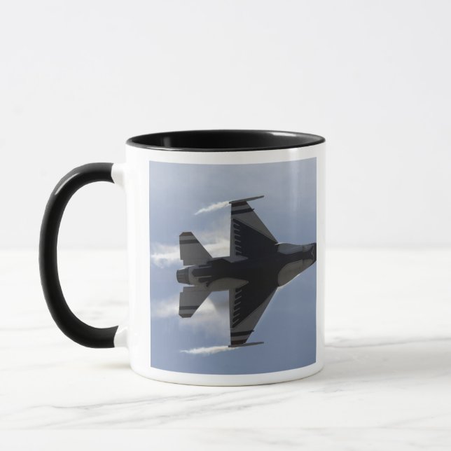 An F-16 Fighting Falcon pulls high G's Mug (Left)
