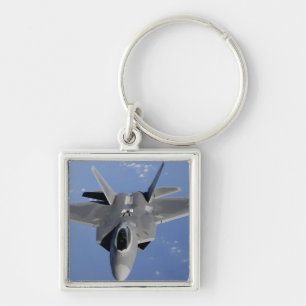 An F-22 Raptor moves into position to receive f 2 Key Ring