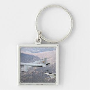 An F-22 Raptor receives fuel from a KC-135 Key Ring