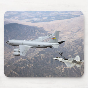 An F-22 Raptor receives fuel from a KC-135 Mouse Mat