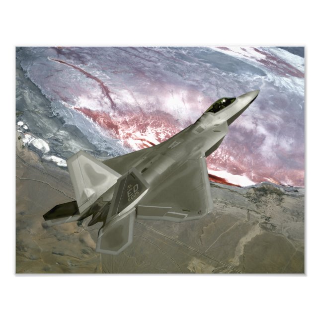 An F/A-22 Raptor flies a training mission Photo Print (Front)