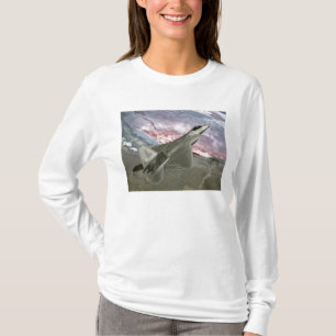 An F/A-22 Raptor flies a training mission T-Shirt