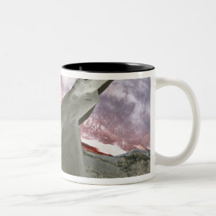 An F/A-22 Raptor flies a training mission Two-Tone Coffee Mug