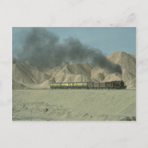 An HGS 2-8-0 is seen in barren landscape near Bost Postcard