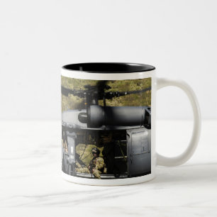 An HH-60 Pave Hawk flies over the desert Two-Tone Coffee Mug