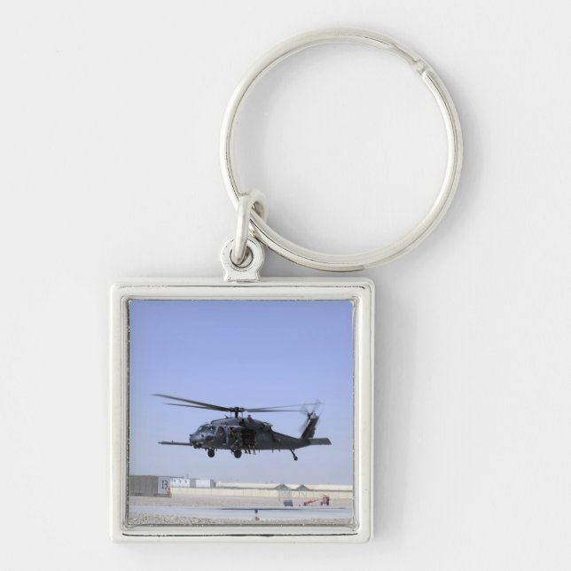 An HH-60G Pave Hawk taking off from Camp Bastio Key Ring (Front)