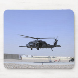 An HH-60G Pave Hawk taking off from Camp Bastio Mouse Mat