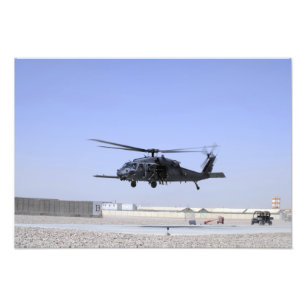 An HH-60G Pave Hawk taking off from Camp Bastio Photo Print