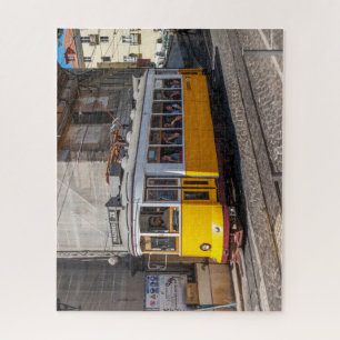 An iconic, yellow tram, Lisbon, Portugal Jigsaw Puzzle