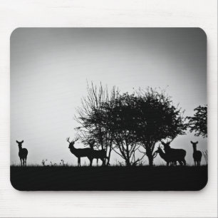 An image of some deer in the morning mist mouse mat