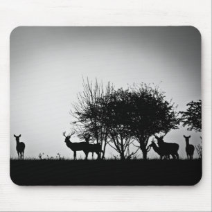 An image of some deer in the morning mist mouse mat