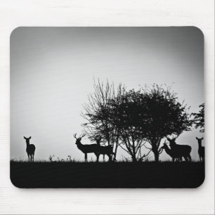 An image of some deer in the morning mist mouse mat