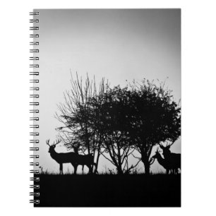 An image of some deer in the morning mist notebook