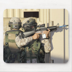 An infantry scout aims his weapon mouse mat