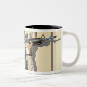 An infantry scout aims his weapon Two-Tone coffee mug