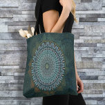 An initiation of the mass circle tote bag<br><div class="desc">Embark on a meditative journey with the "Initiation of the Mass Circle" Tote Bag featuring harmonized geometric circles in textile mandala art. Celebrate self-understanding and success with the Kalachakra mass circle design on this medium-sized,  all-over-print tote bag that combines style and sustainability. Made in the USA.</div>