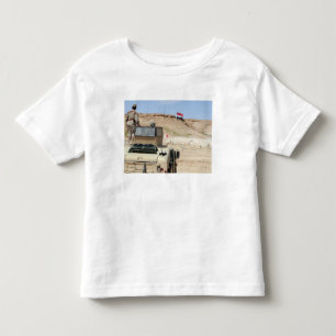 An instructor watches as an Iraqi army soldier Toddler T-Shirt