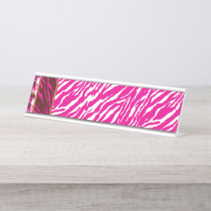 An intricate floral pattern in pink and white, art desk name plate