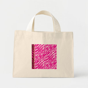 An intricate floral pattern in pink and white, art mini tote bag