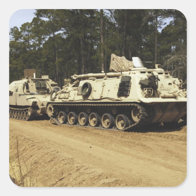 An M-88 recovery vehicle begins to tow an M992 Square Sticker (Front)