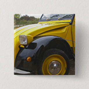 An old black and yellow Citroen 2CV 2 CV, 15 Cm Square Badge