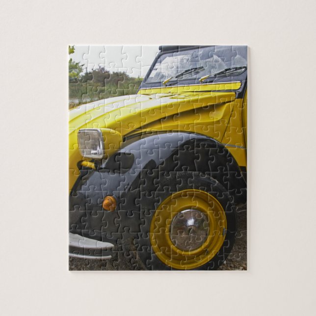 An old black and yellow Citroen 2CV 2 CV, Jigsaw Puzzle (Vertical)