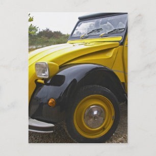 An old black and yellow Citroen 2CV 2 CV, Postcard