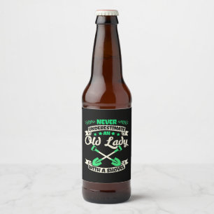 An Old Lady Garden With A Shovel Beer Bottle Label