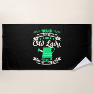 An Old Lady Garden With Watering Can Beach Towel