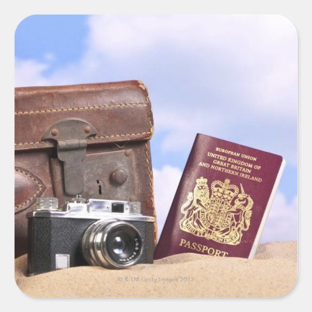 An old leather suitcase, retro camera and square sticker (Front)