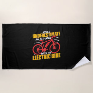An Old Man With An Electrec Bike Beach Towel